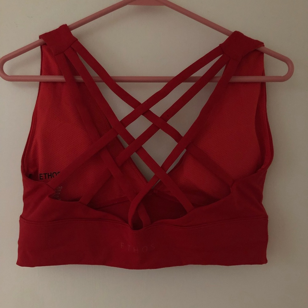 Ethos sports bra, worn less than 5 times, like new. Includes removable bra pads